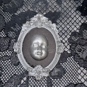 Silver Gothic cabinet of curiosities doll head oddity mini wall hanging art